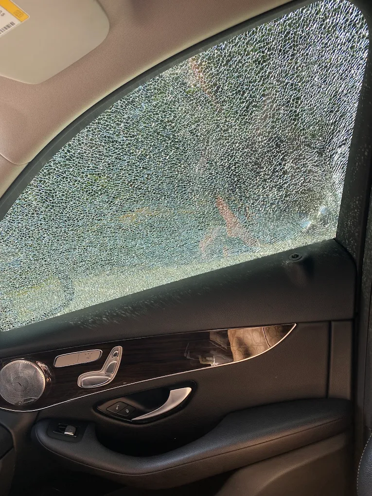 Shattered driver side window before auto glass replacement by Otto Glass in Philadelphia