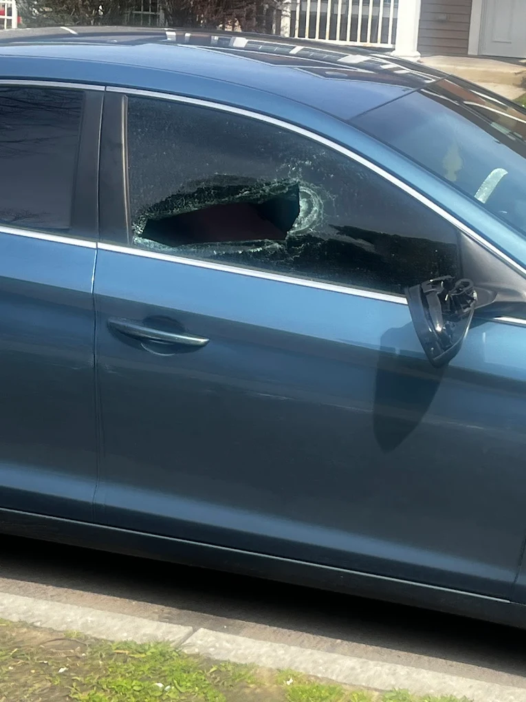 Car with broken side window before Otto Glass repair in Philadelphia area